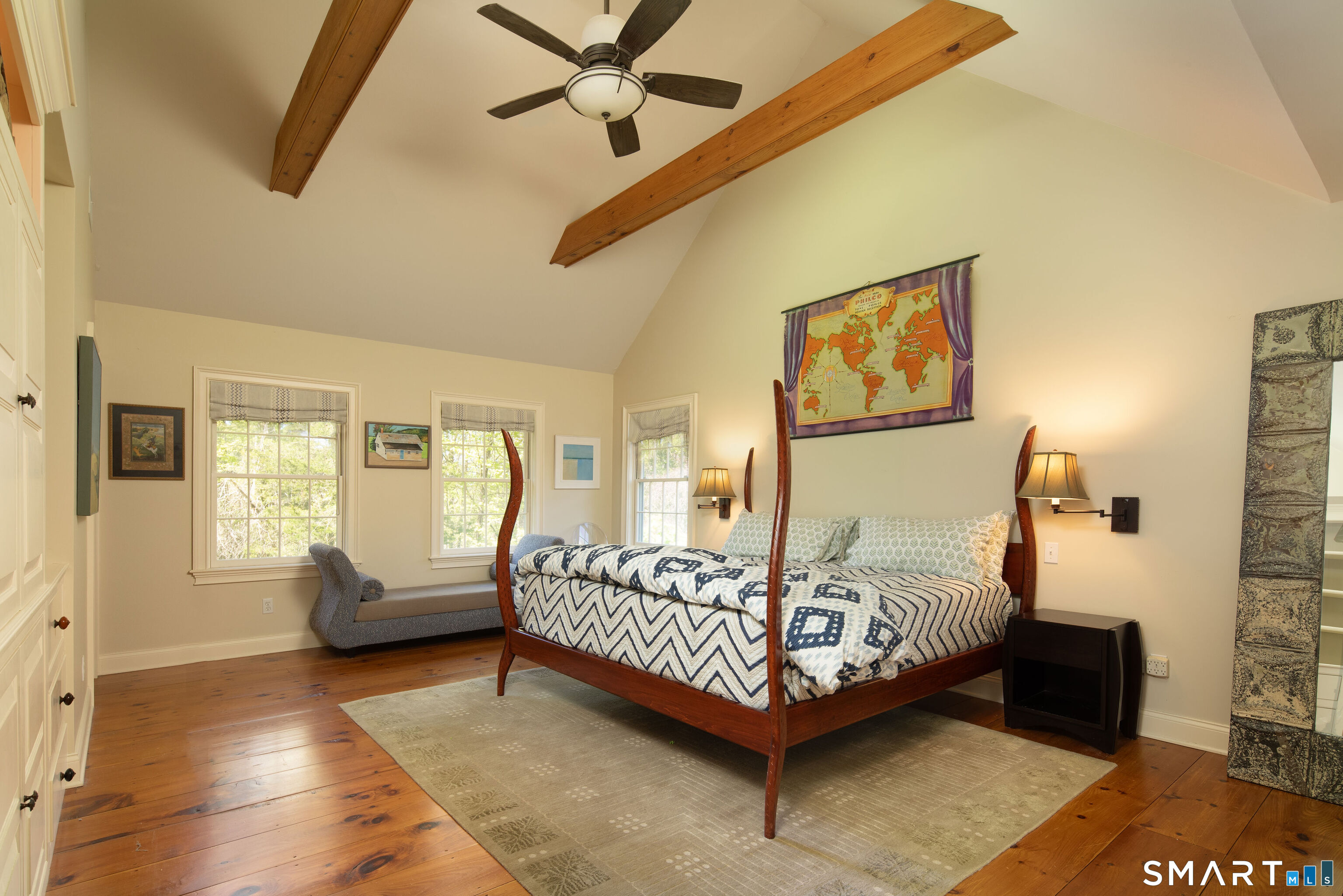 7 Cooper Hill Road Salisbury, CT 06068 - Photo 24 of 36 a bedroom with a bed a couch and dresser