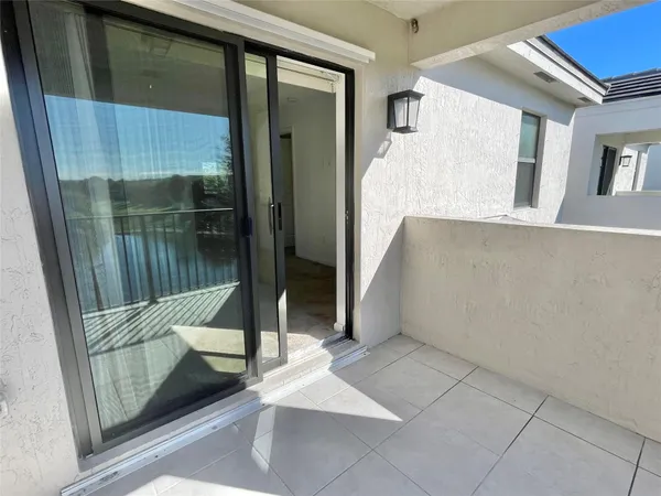 a view of a glass door and a glass door