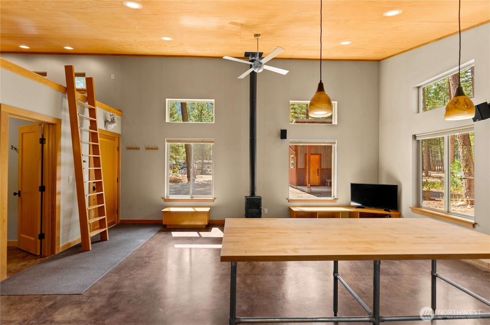 16 Littell Road Mazama, WA 98833 - Photo 13 of 40 a living room with stainless steel appliances furniture stove top oven and refrigerator