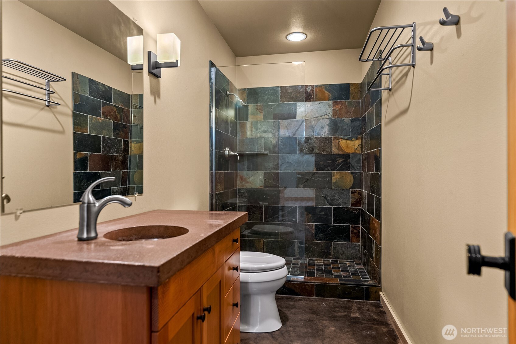 16 Littell Road Mazama, WA 98833 - Photo 16 of 40 a bathroom with a sink toilet and shower