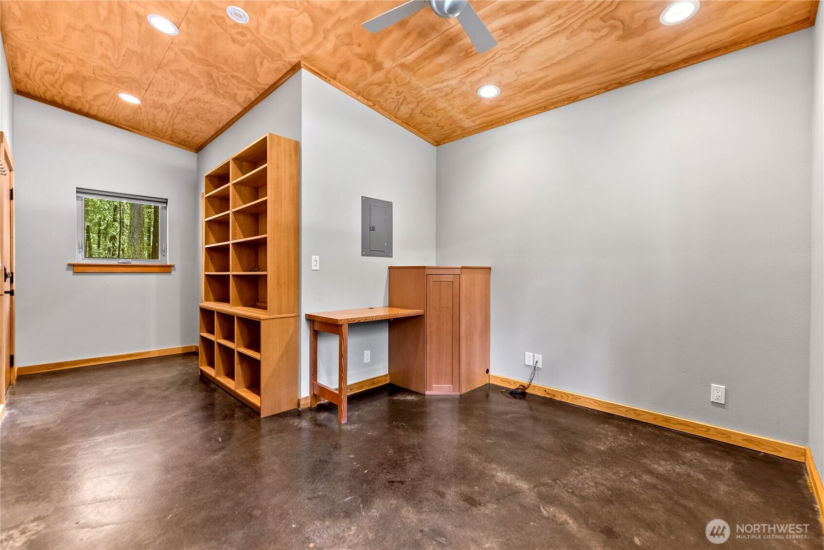 16 Littell Road Mazama, WA 98833 - Photo 21 of 40 a view of an empty room with wooden floor and windows