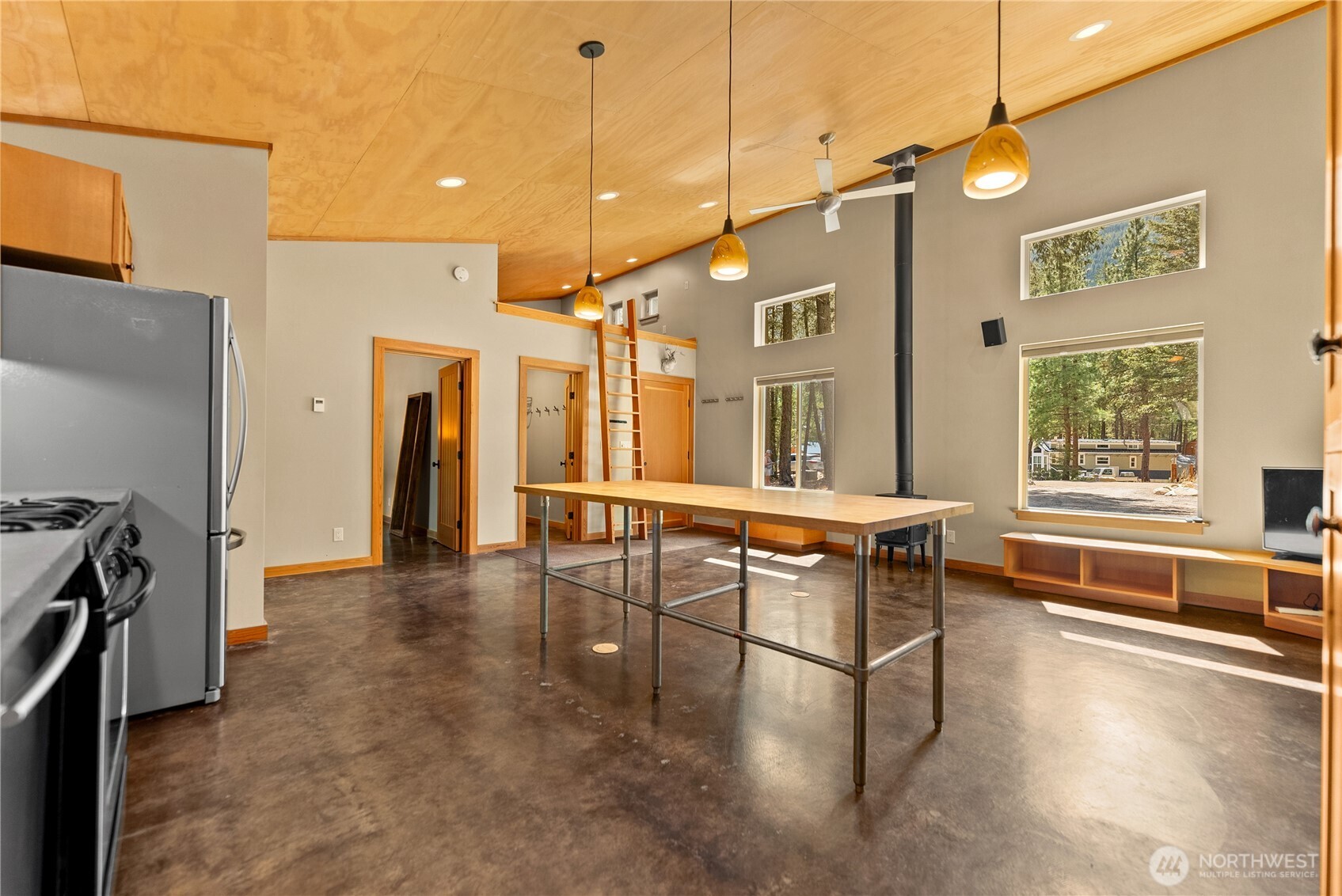 16 Littell Road Mazama, WA 98833 - Photo 27 of 40 a large kitchen with sink and refrigerator