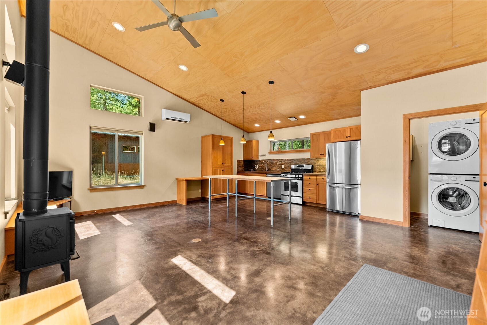 16 Littell Road Mazama, WA 98833 - Photo 32 of 40 a view of dining room with furniture and wooden floor