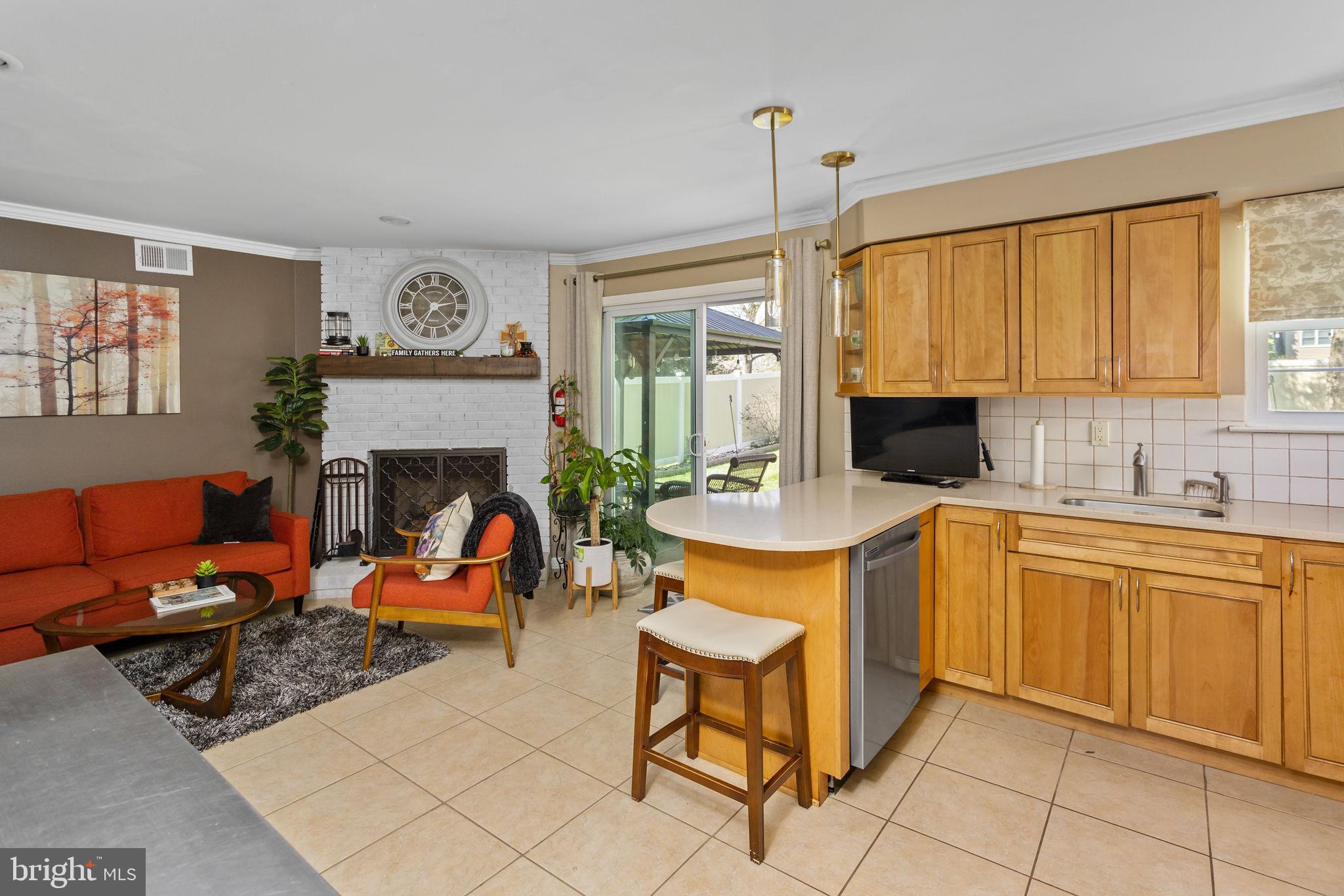 18 Geraldine Road East Windsor, NJ 08520 - Photo 16 of 42 a kitchen with stainless steel appliances granite countertop a stove a sink and a microwave