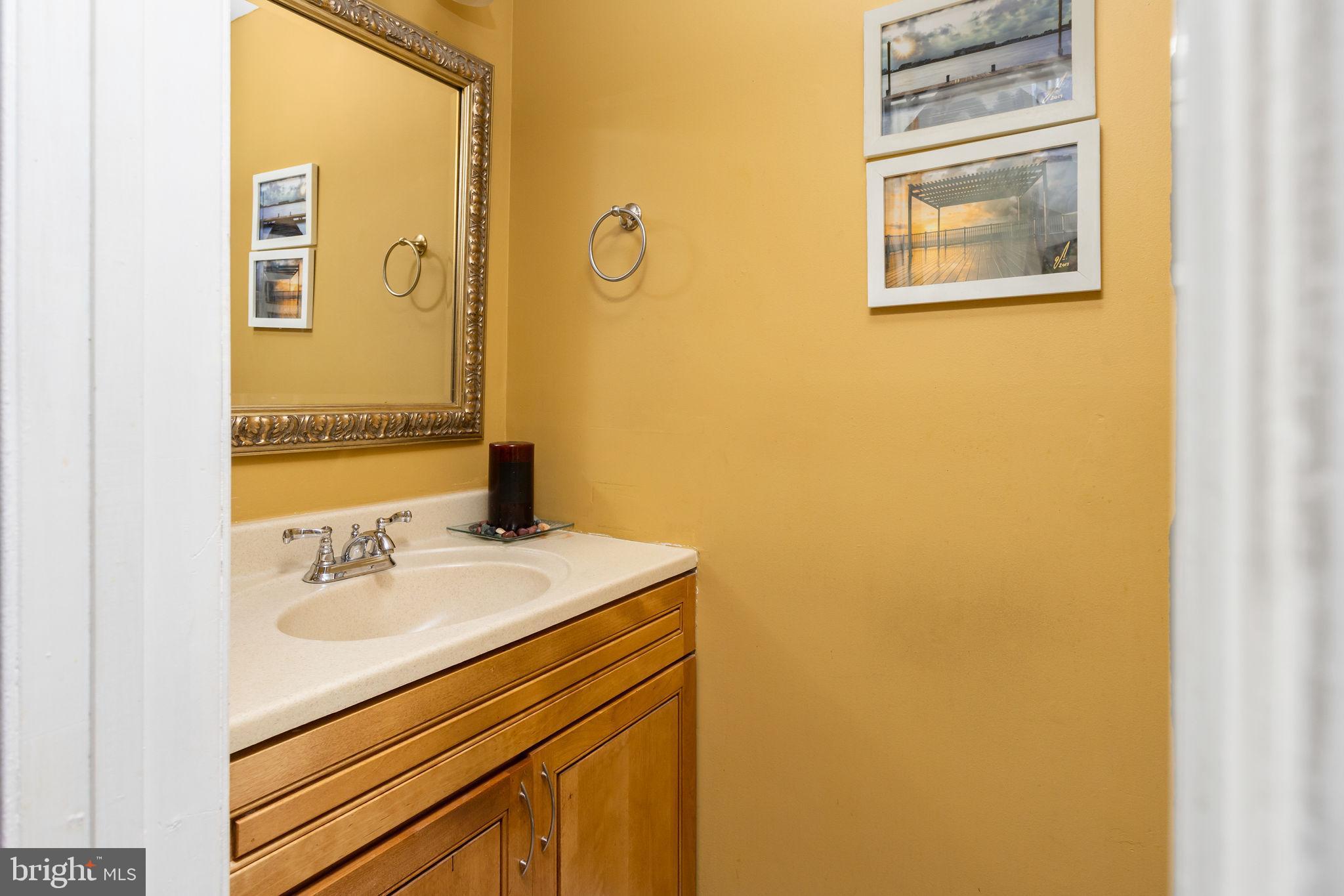 18 Geraldine Road East Windsor, NJ 08520 - Photo 19 of 42 a bathroom with a sink and a mirror