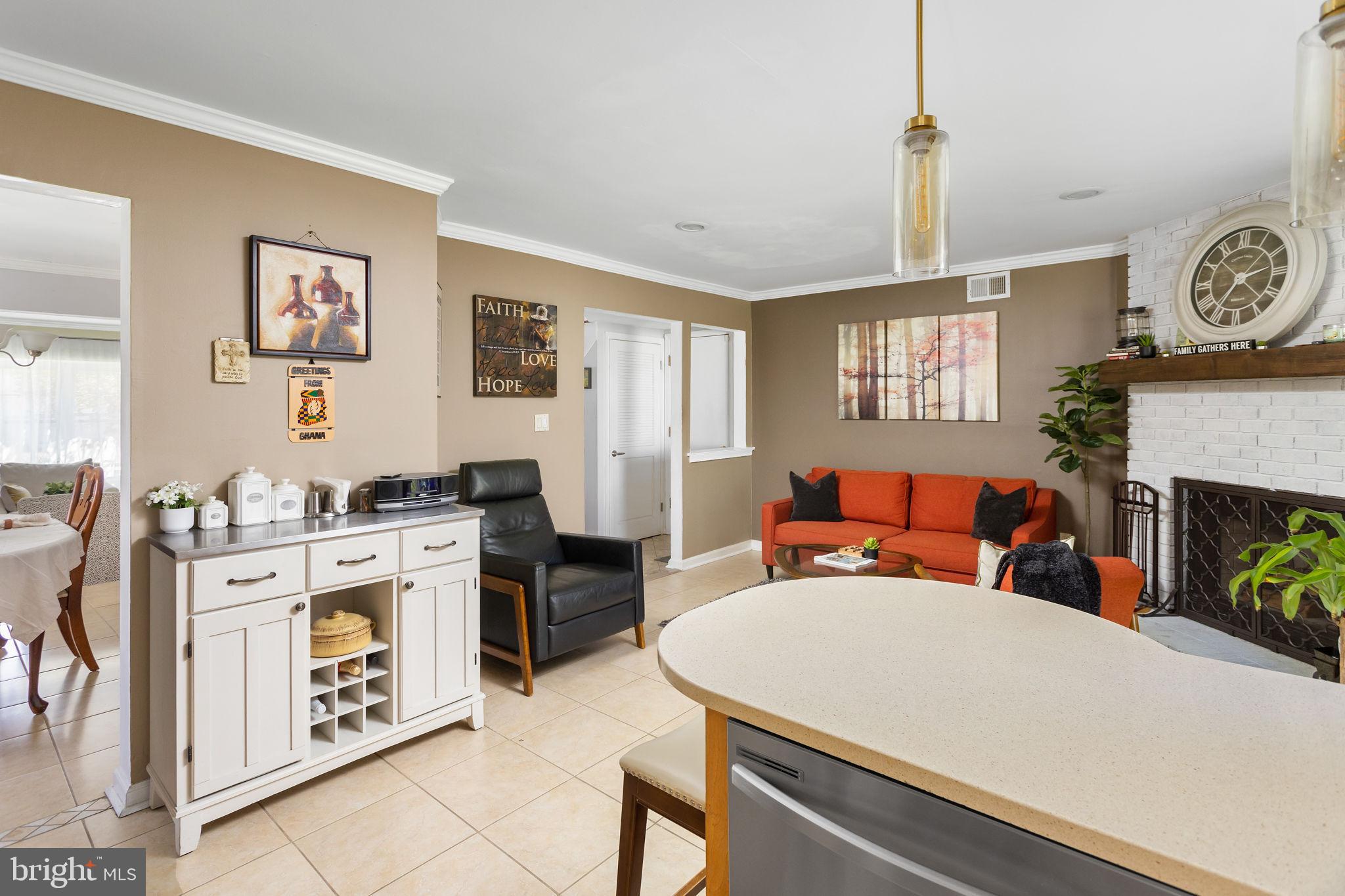 18 Geraldine Road East Windsor, NJ 08520 - Photo 22 of 42 a living room with furniture and a fireplace