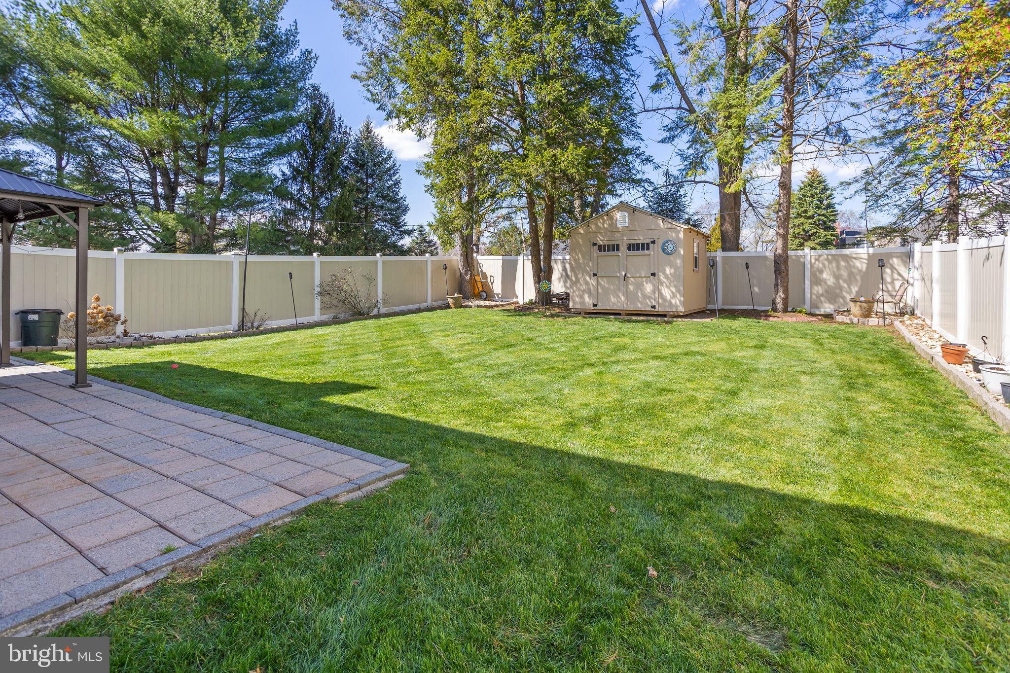 18 Geraldine Road East Windsor, NJ 08520 - Photo 29 of 42 a view of a backyard with a small cabin