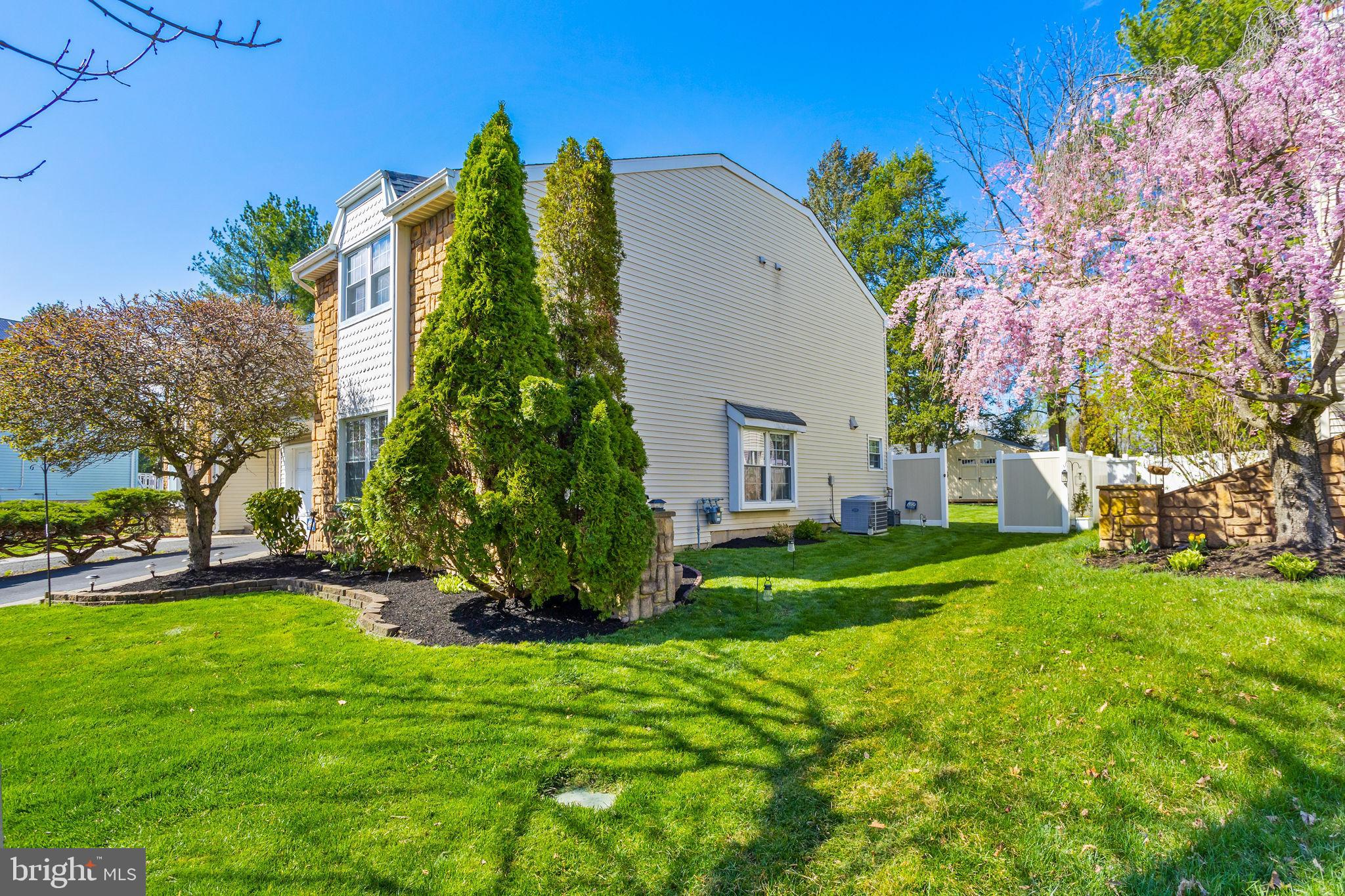 18 Geraldine Road East Windsor, NJ 08520 - Photo 3 of 42 a front view of a house with a yard and trees
