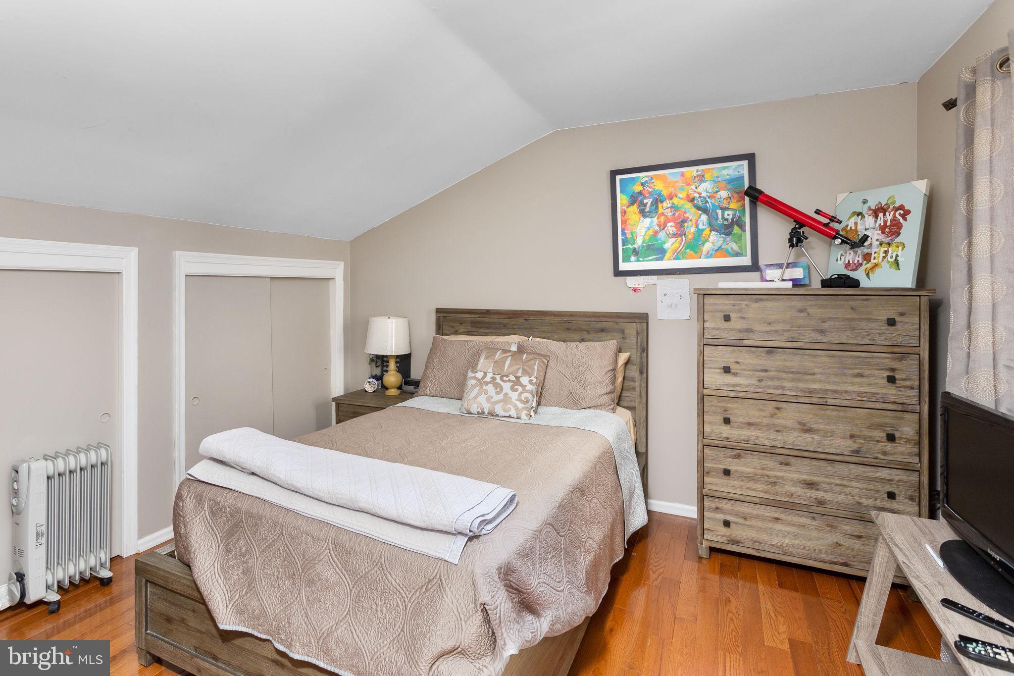 18 Geraldine Road East Windsor, NJ 08520 - Photo 31 of 42 a bedroom with a bed and a dresser