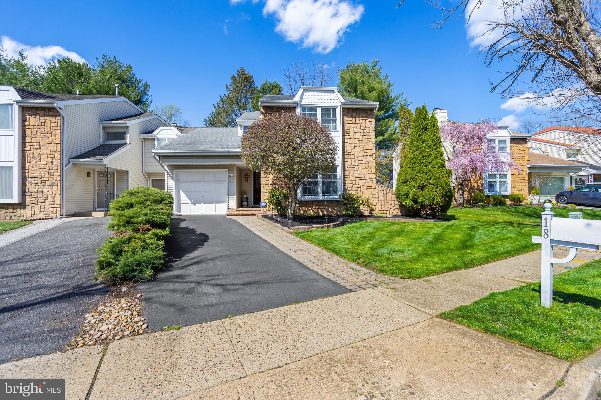 18 Geraldine Road East Windsor, NJ 08520 - Photo 4 of 42 front view of a house with a yard
