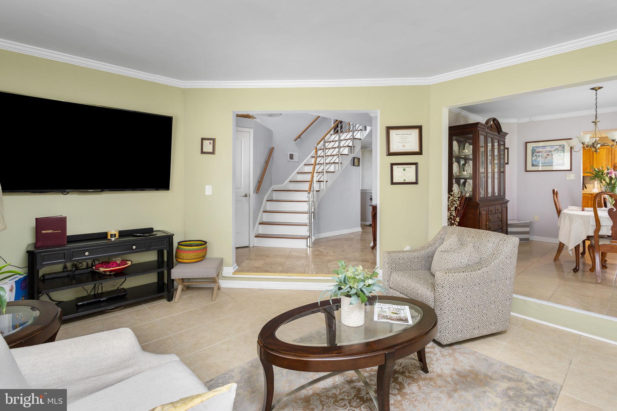 18 Geraldine Road East Windsor, NJ 08520 - Photo 5 of 42 a living room with furniture and a flat screen tv