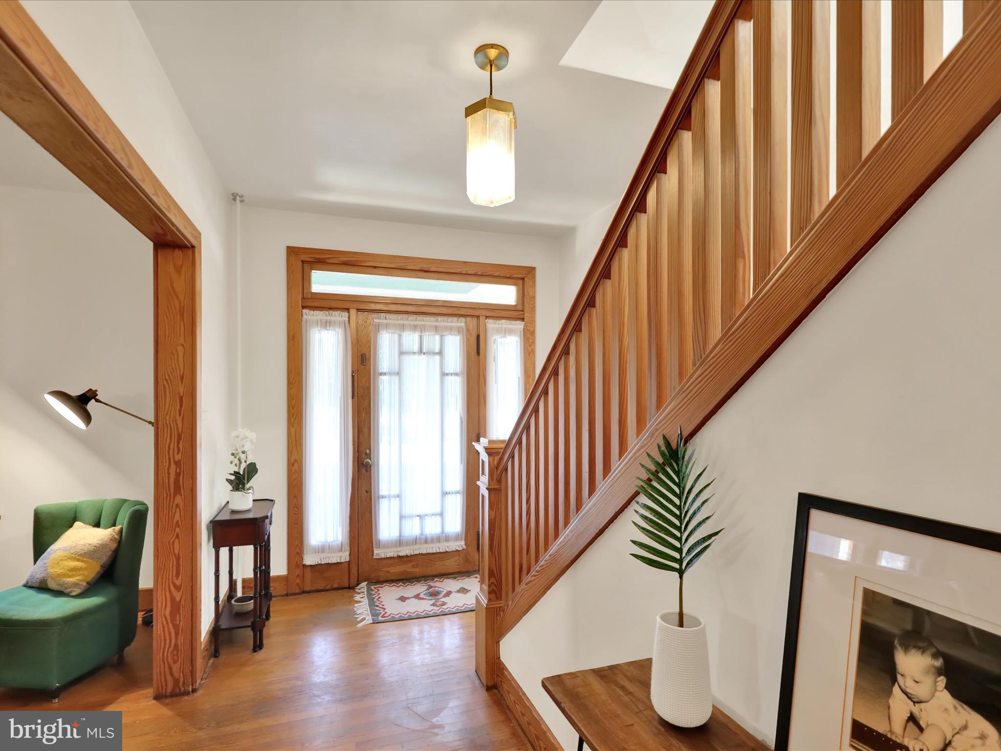 46 West Main Street Lebanon, PA 17042 - Photo 15 of 33 a dining room with wooden floor and a potted plant
