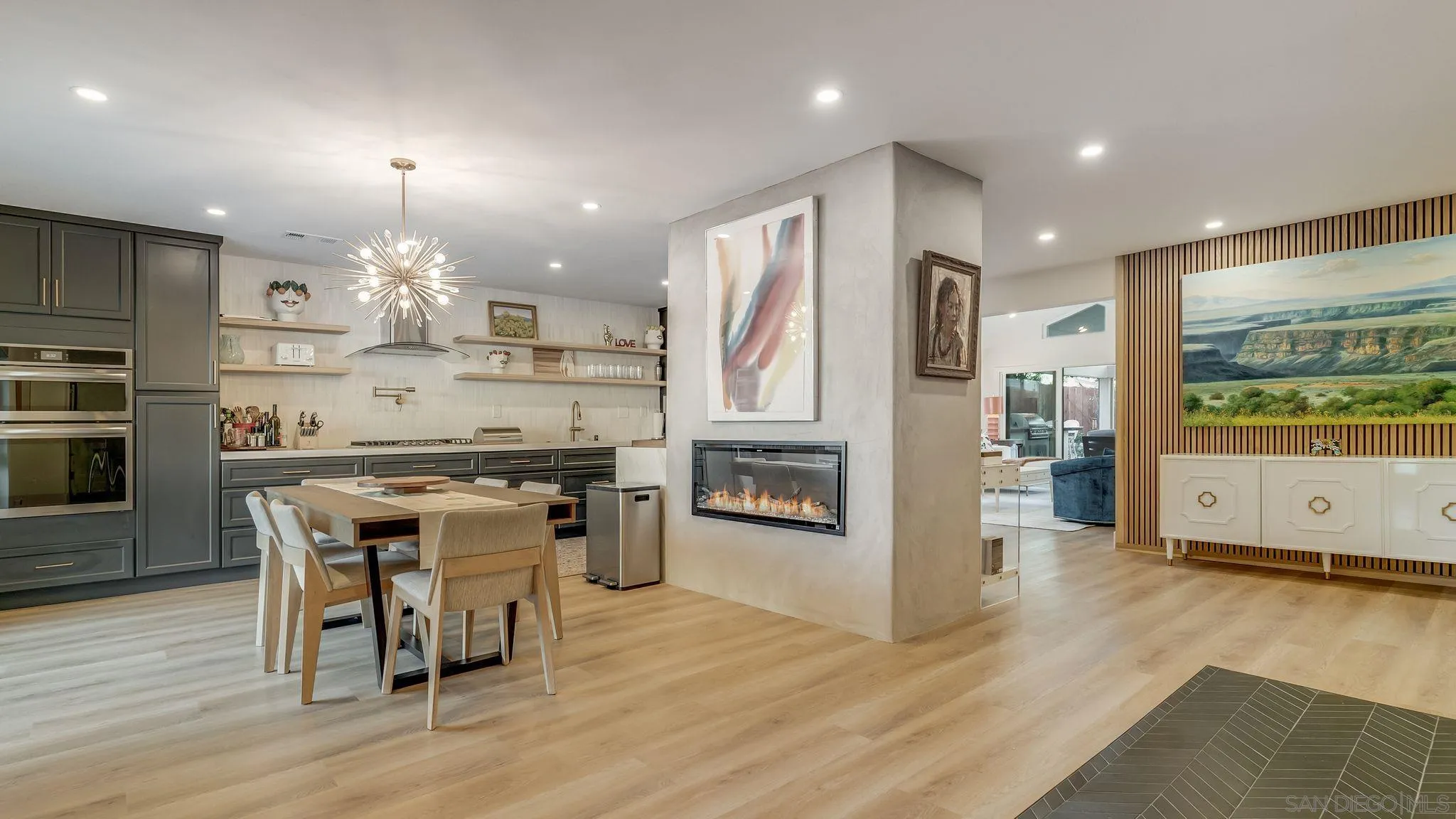 14146 Recuerdo Drive Del Mar, CA 92014 - Photo 12 of 54 a kitchen with stainless steel appliances kitchen island granite countertop a refrigerator and a stove top oven