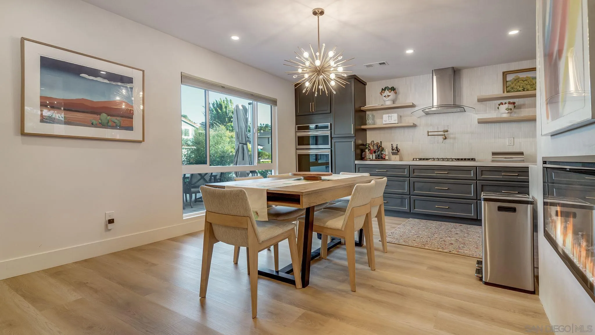 14146 Recuerdo Drive Del Mar, CA 92014 - Photo 14 of 54 a view of a dining room with furniture window and wooden floor