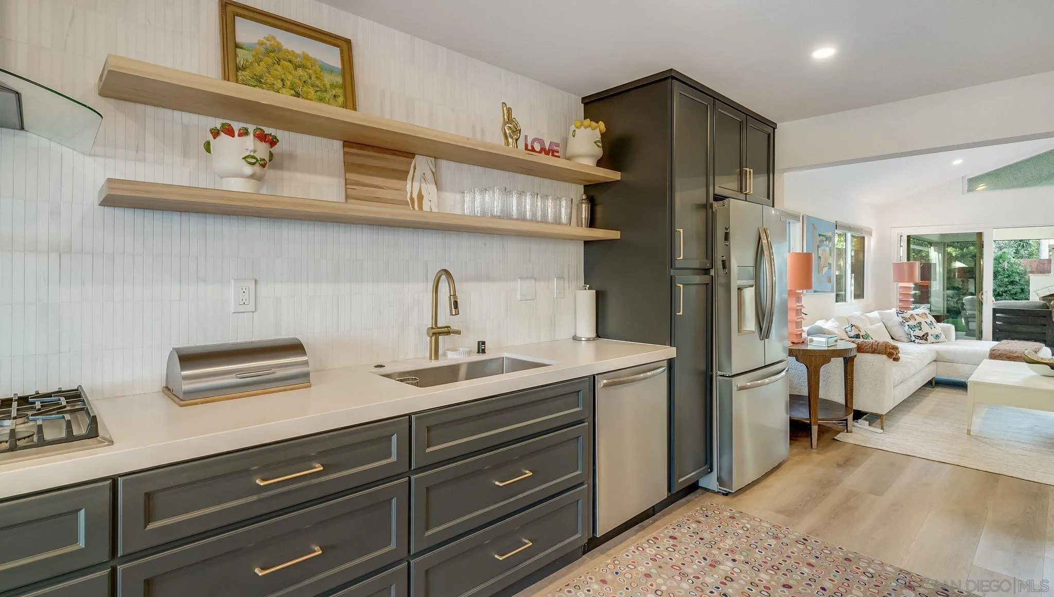 14146 Recuerdo Drive Del Mar, CA 92014 - Photo 19 of 54 a kitchen with a sink and cabinets