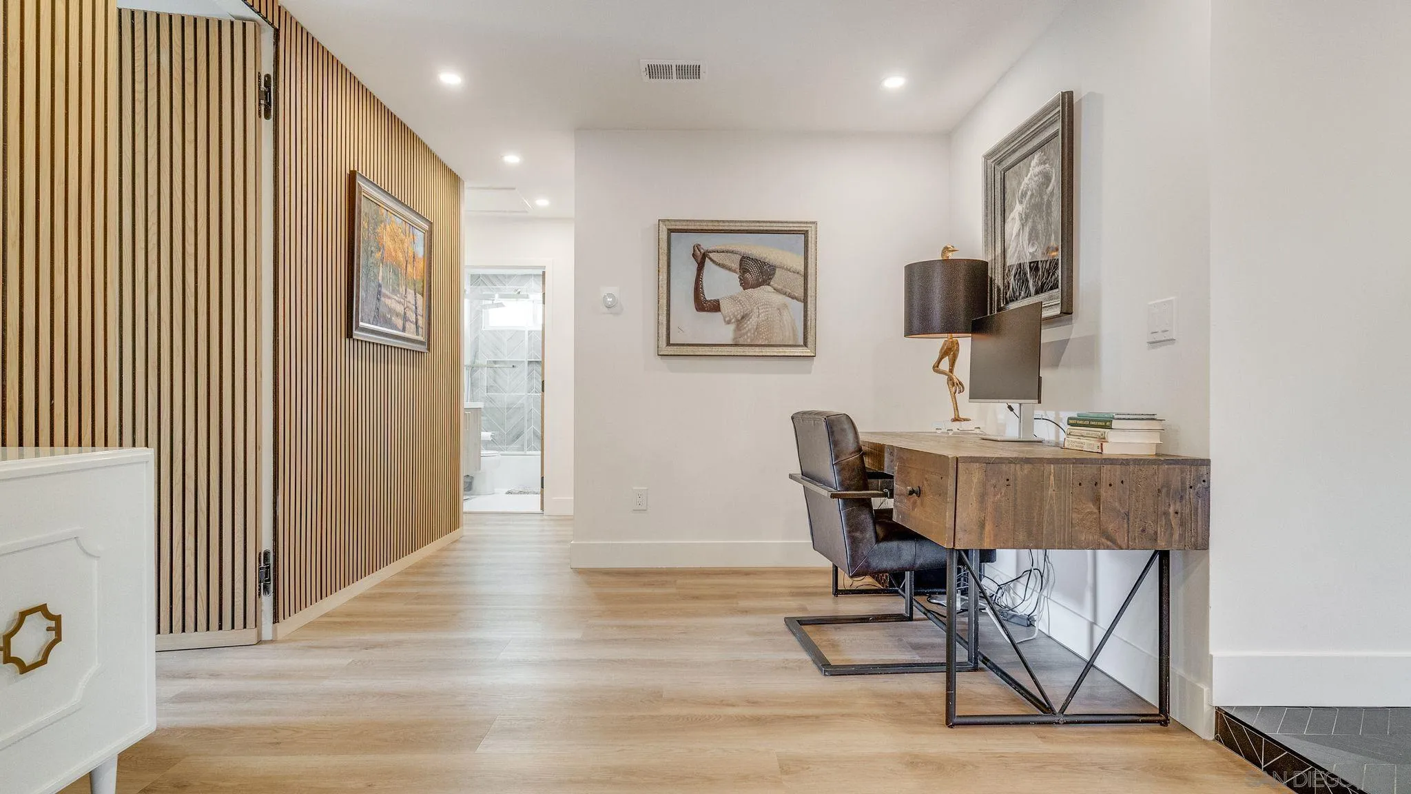 14146 Recuerdo Drive Del Mar, CA 92014 - Photo 21 of 54 a view of a workspace with furniture and wooden floor
