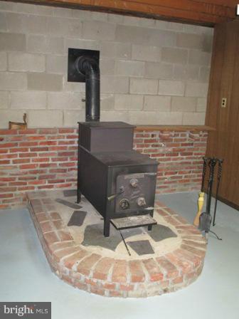 19 Fort Hoyle Road Joppa, MD 21085 - Photo 18 of 30 Basement wood stove