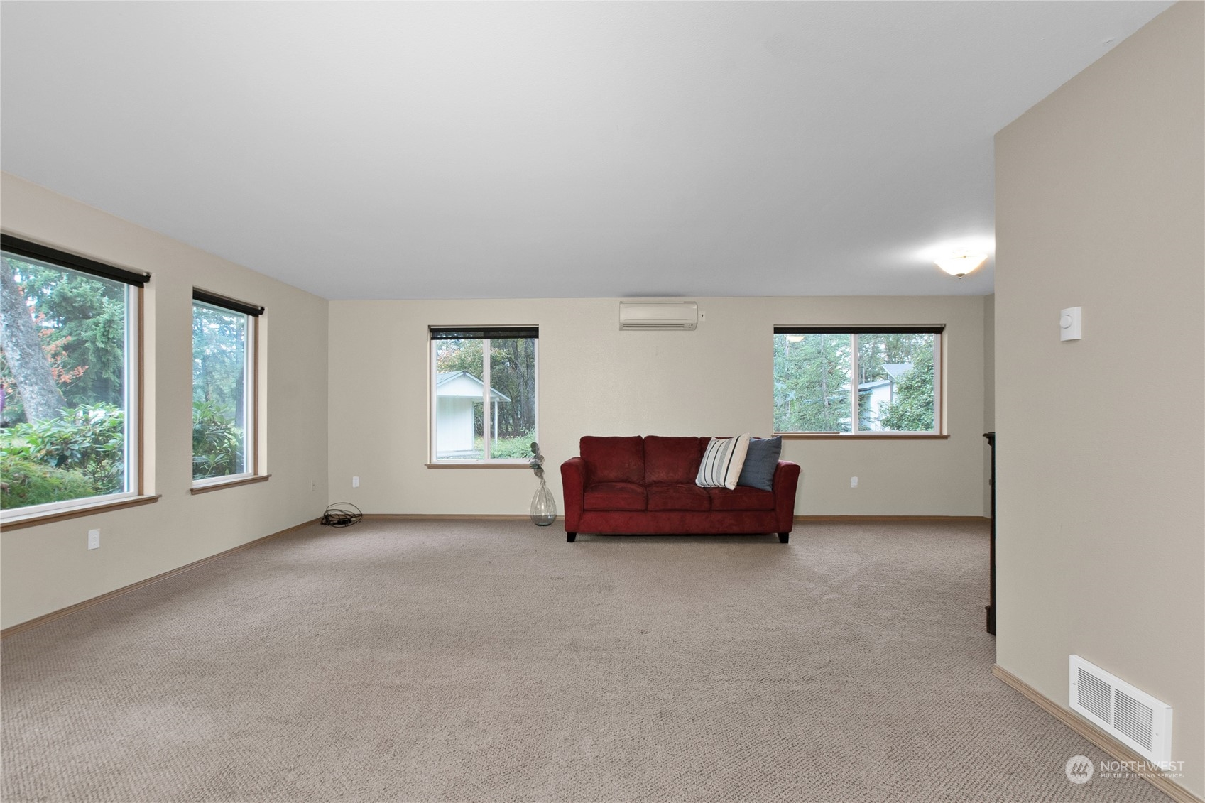 8028 186th Avenue Southwest Rochester, WA 98579 - Photo 5 of 35 a living room with furniture and a window