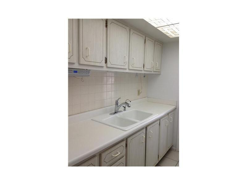 1150 East Sample Road, Unit 109A Pompano Beach, FL 33064 - Photo 5 of 9 Exterior Front