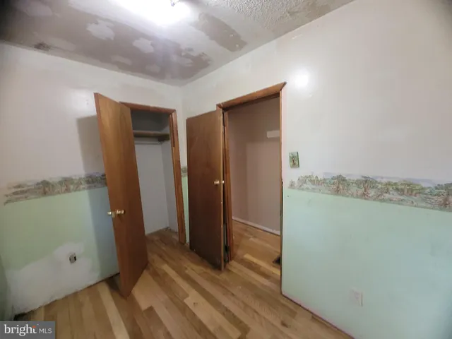 a bathroom with a sink toilet and mirror