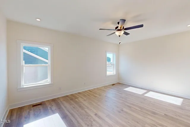 a view of entryway with racks on the wall