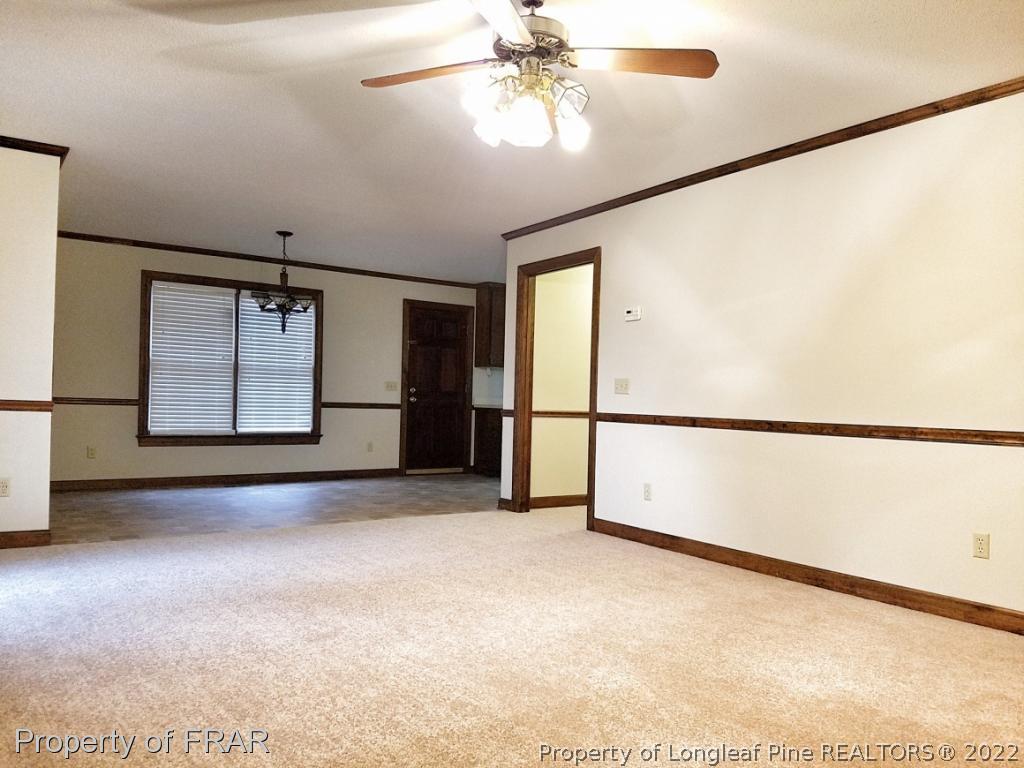 985 Line Road Cameron, NC 28326 - Photo 14 of 31 a view of an empty room with a window