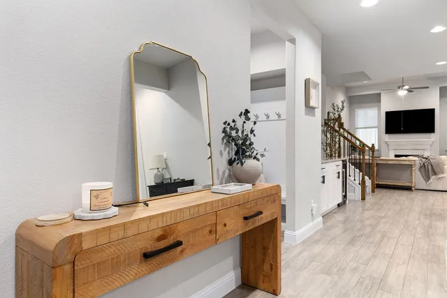 a room with a couch and a flat screen tv