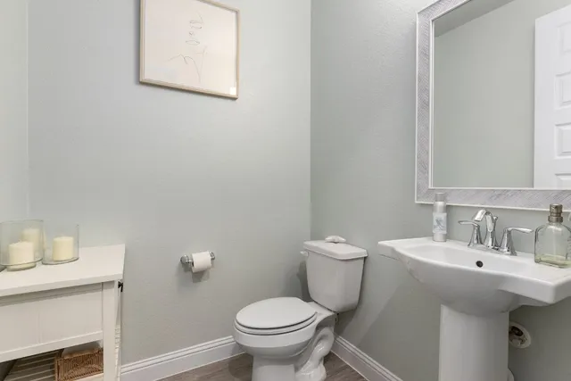a bathroom with a sink and a toilet