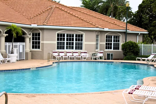 a front view of a house with swimming pool