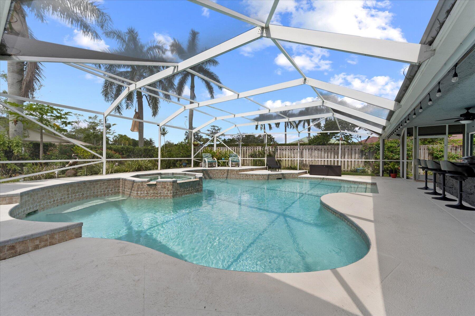 1373 Brampton Cove Wellington, FL 33414 - Photo 24 of 35 a view of a swimming pool