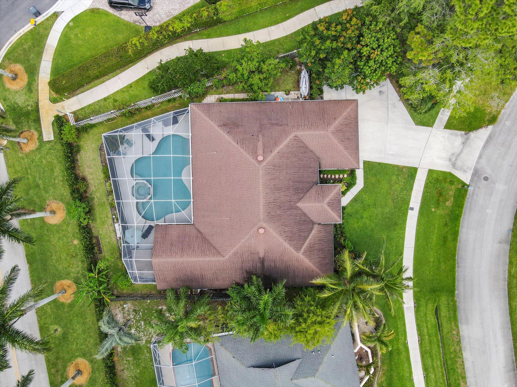1373 Brampton Cove Wellington, FL 33414 - Photo 31 of 35 an aerial view of a house with a yard basket ball court and outdoor seating