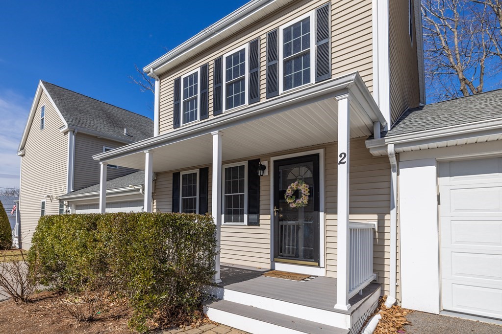 90 Central Street, Unit 2 East Bridgewater, MA 02333 - Photo 6 of 26 a view of a building with a window and pathway