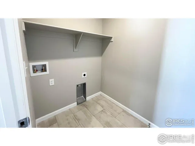 a black and white photo of a living room
