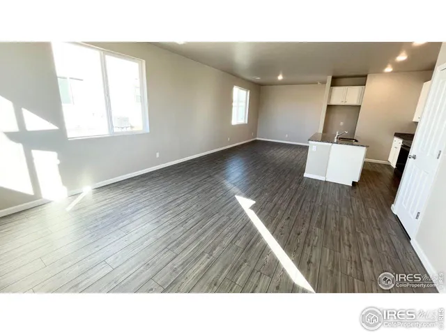 a upper view of a living room and dining room