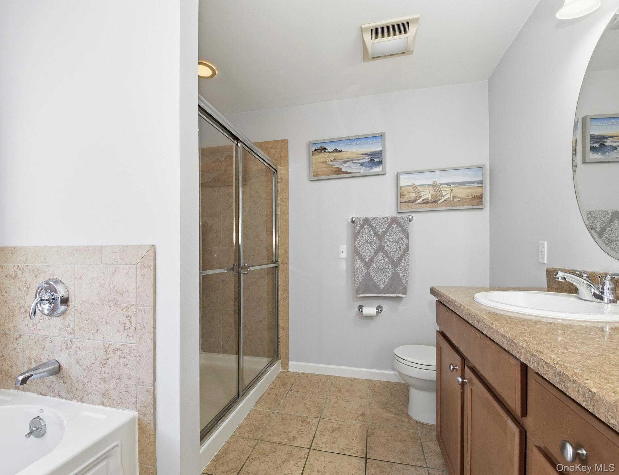 15 Revolution Road Cold Spring, NY 10516 - Photo 20 of 30 a bathroom with a granite countertop sink a toilet and shower