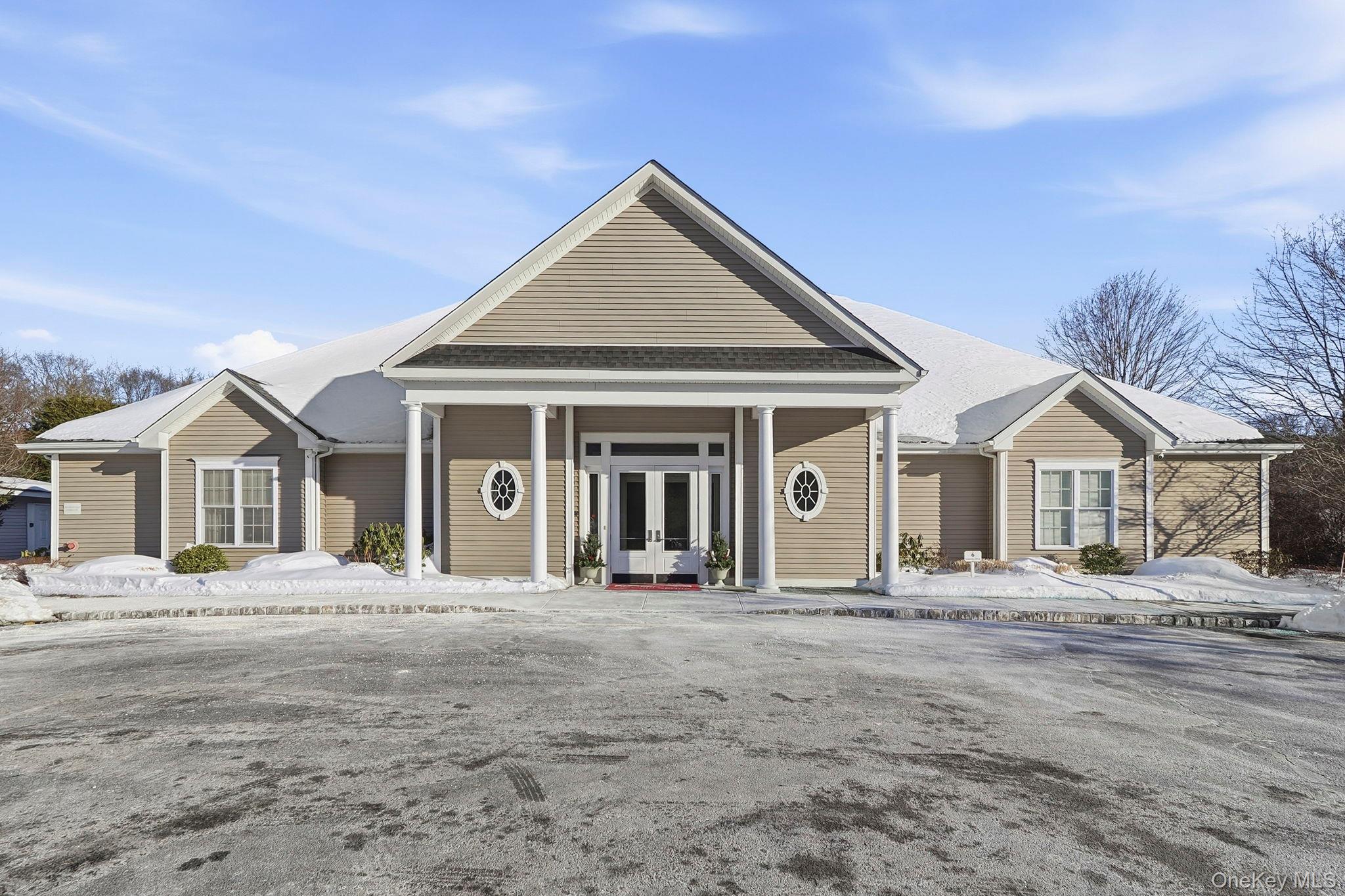 15 Revolution Road Cold Spring, NY 10516 - Photo 27 of 30 a front view of a house with a yard