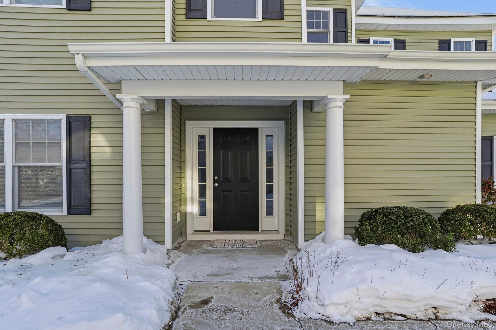 15 Revolution Road Cold Spring, NY 10516 - Photo 4 of 30 a view of a house with potted plants