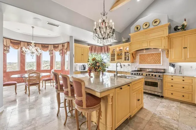 a view of a kitchen counter top space and stainless steel appliances