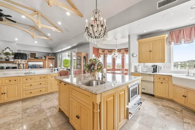 a living room with furniture ceiling fan and a rug