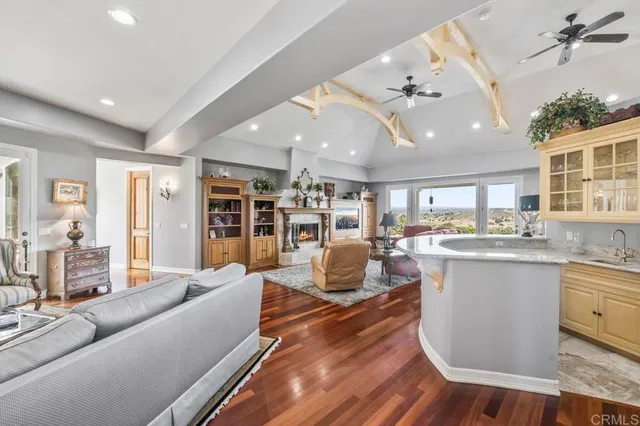 a view of a kitchen with sink washer and dryer