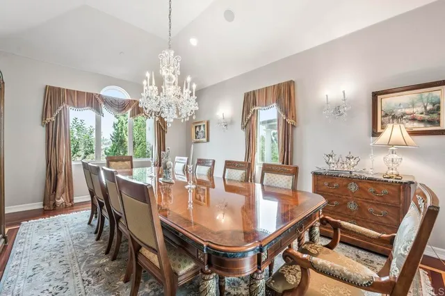 a bathroom with a granite countertop toilet a sink and a bathtub
