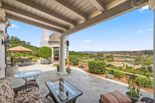 a view of a terrace with a garden