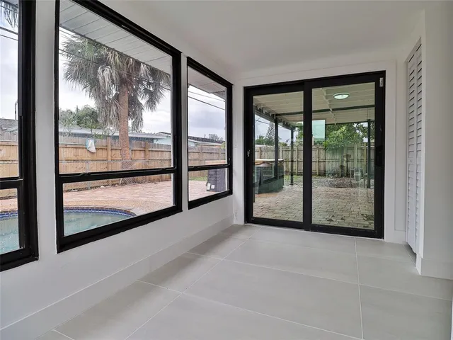 a view of an large window with an outdoor space