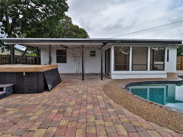 a view of a house with roof deck