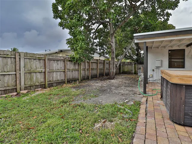 a view of a backyard with plants