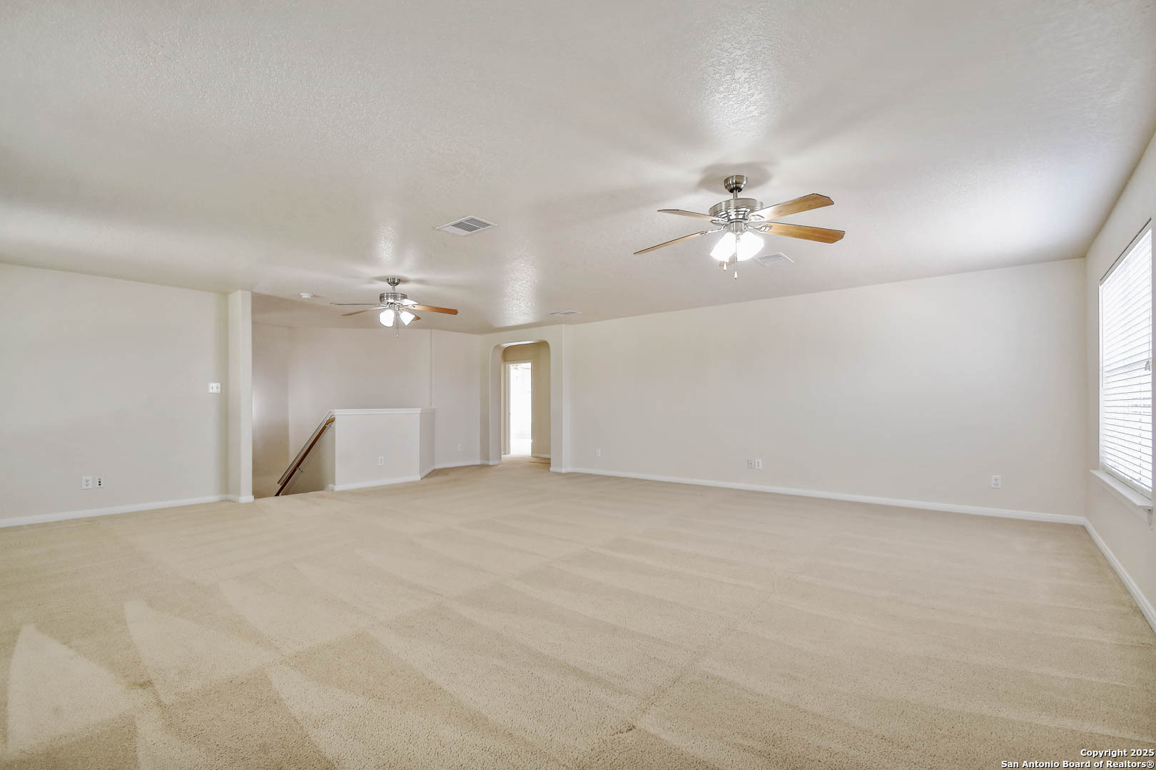 184 Springtree Parkway Cibolo, TX 78108 - Photo 26 of 36 wooden floor in an empty room with a window