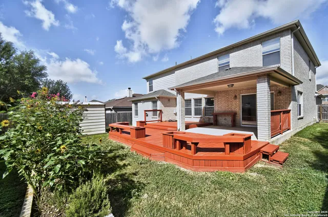 an outdoor space with pool and furniture