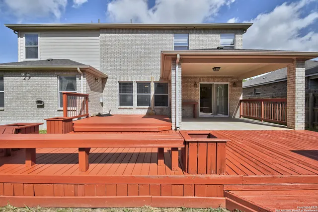 a outdoor view of a house with a patio