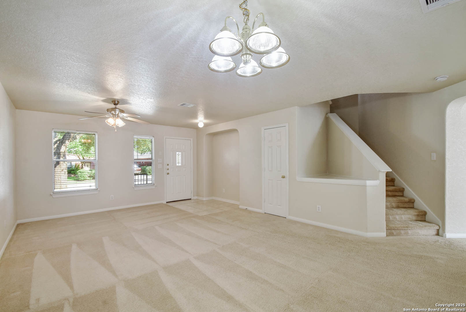 184 Springtree Parkway Cibolo, TX 78108 - Photo 7 of 36 a view of an empty room with a window