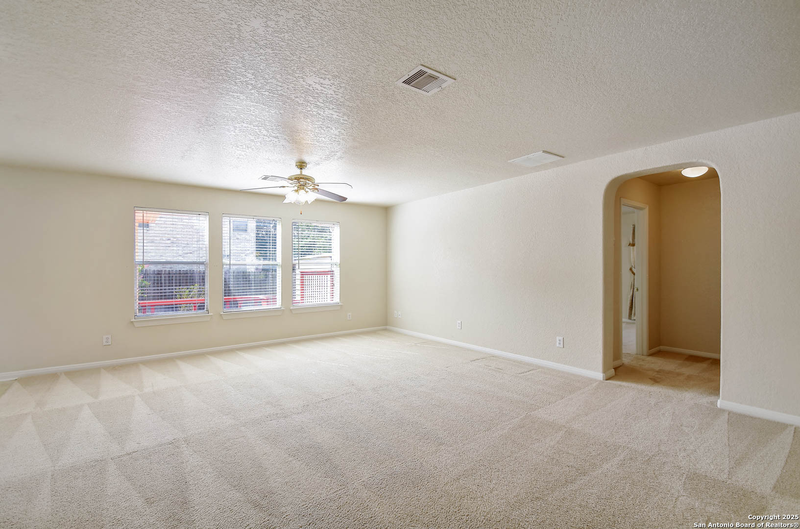 184 Springtree Parkway Cibolo, TX 78108 - Photo 9 of 36 a view of an empty room with a window